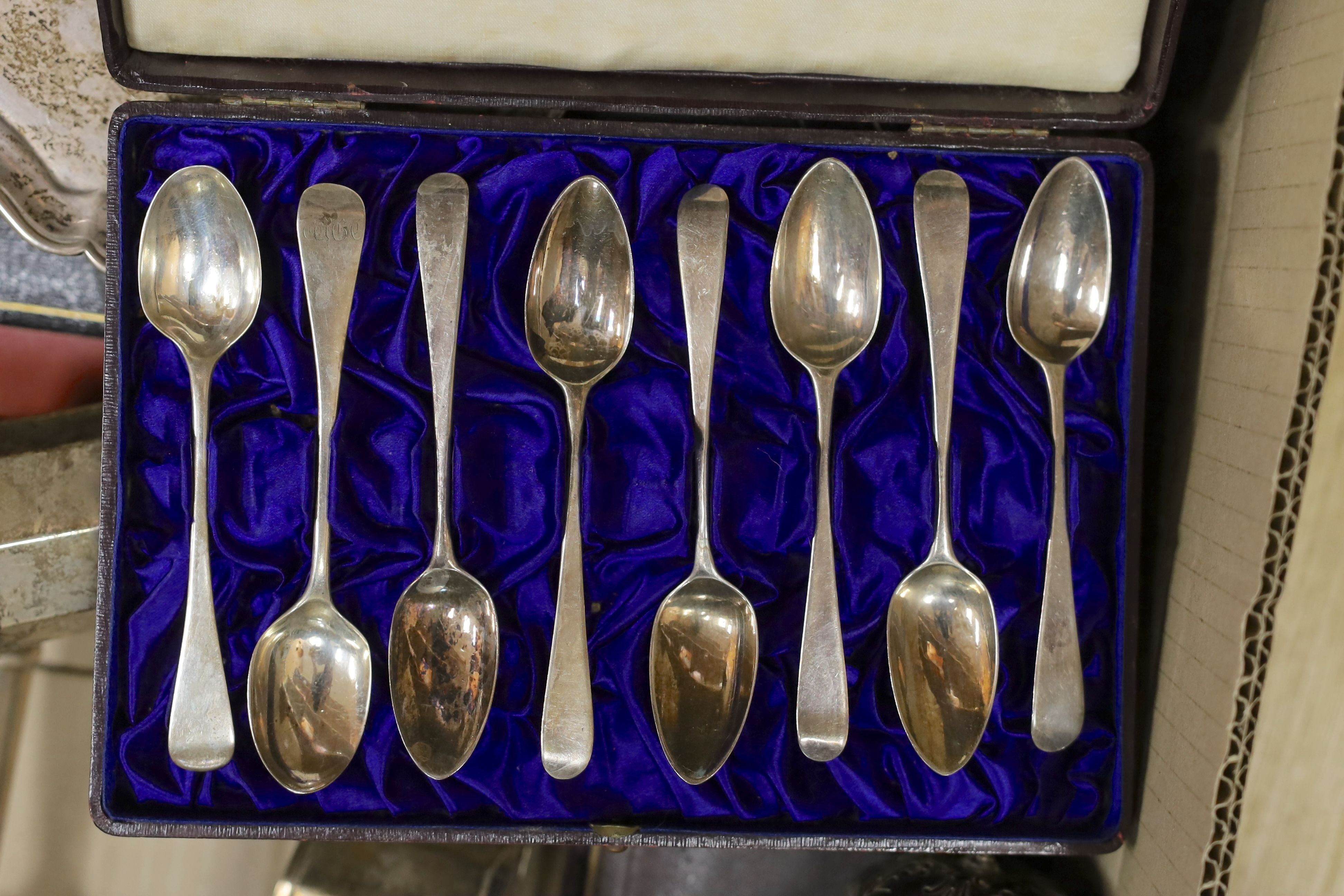 A mixed quantity of assorted small silver, including cased sets of teaspoons and tea knives, a cased pair of Victorian silver fish servers by George Adams, small waiter, condiments, napkin rings, pair of silver candlesti